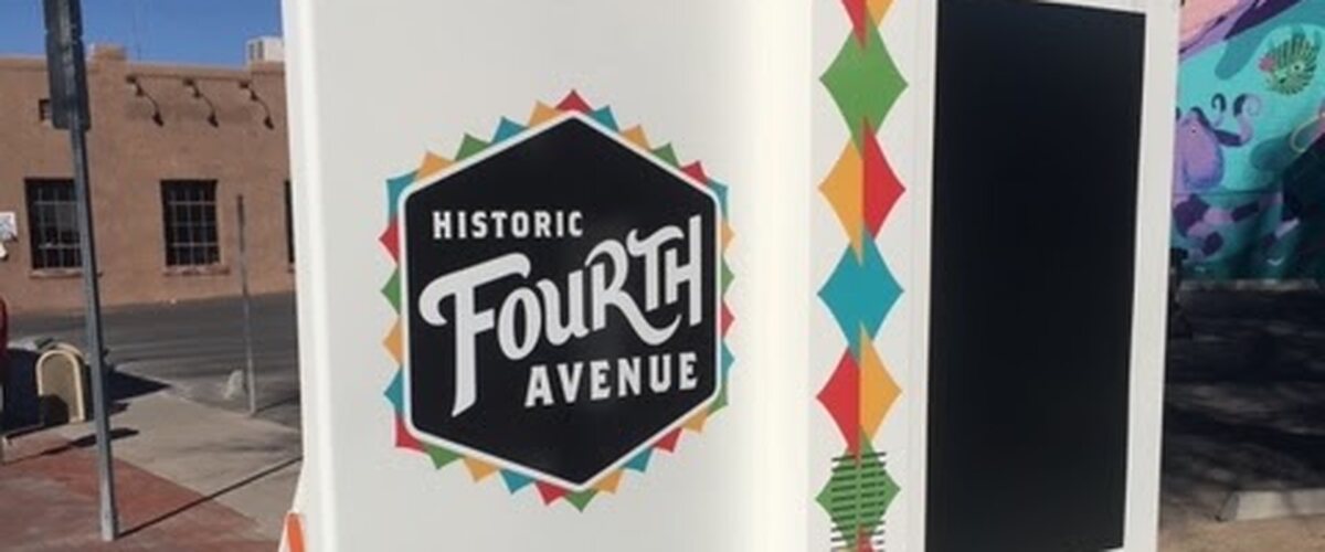Historic Fourth Avenue digital wayfinding kiosk installed on the sidewalk in Tucson, Arizona