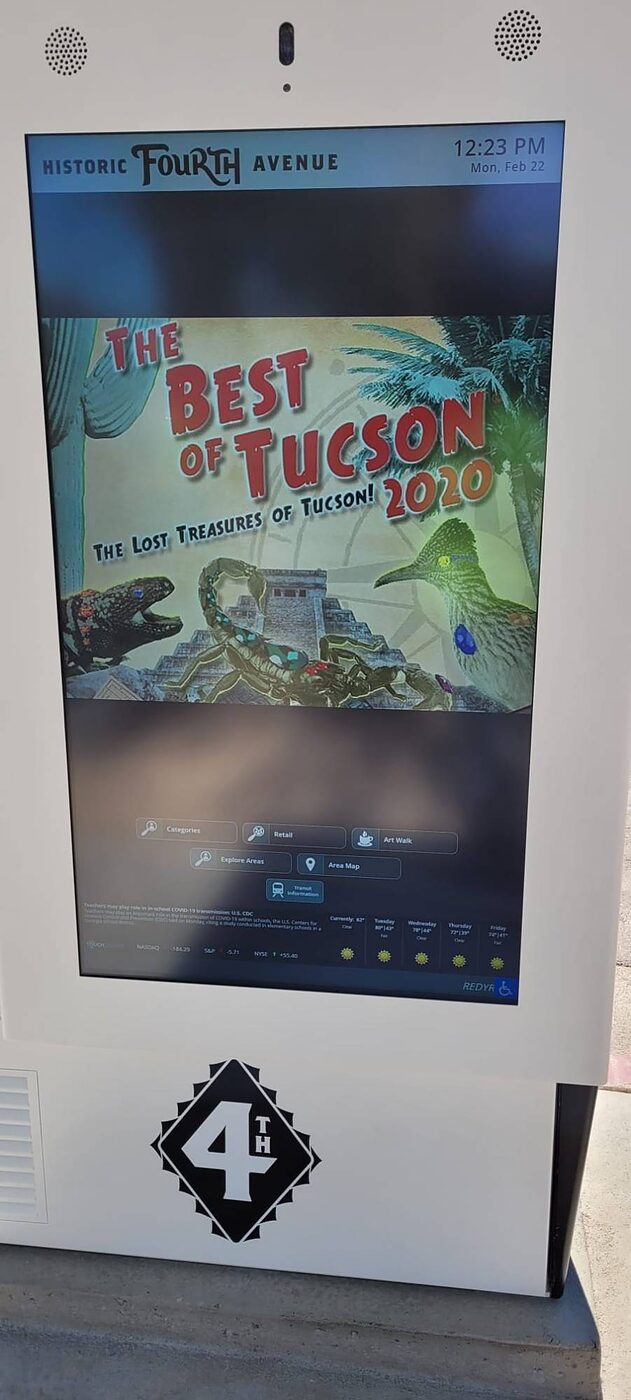 Live touchscreen display on a Historic Fourth Avenue kiosk showing wayfinding categories, area map and transit information